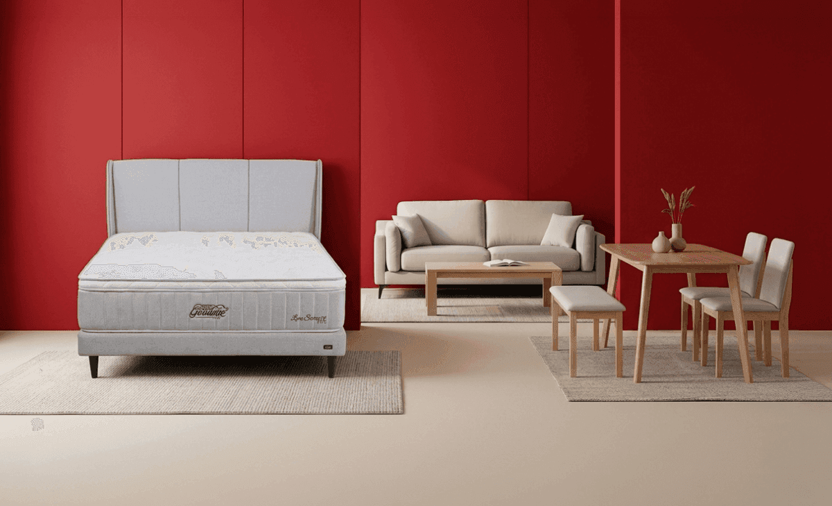 A Goodnite bedroom, sofa and dining set arranged together